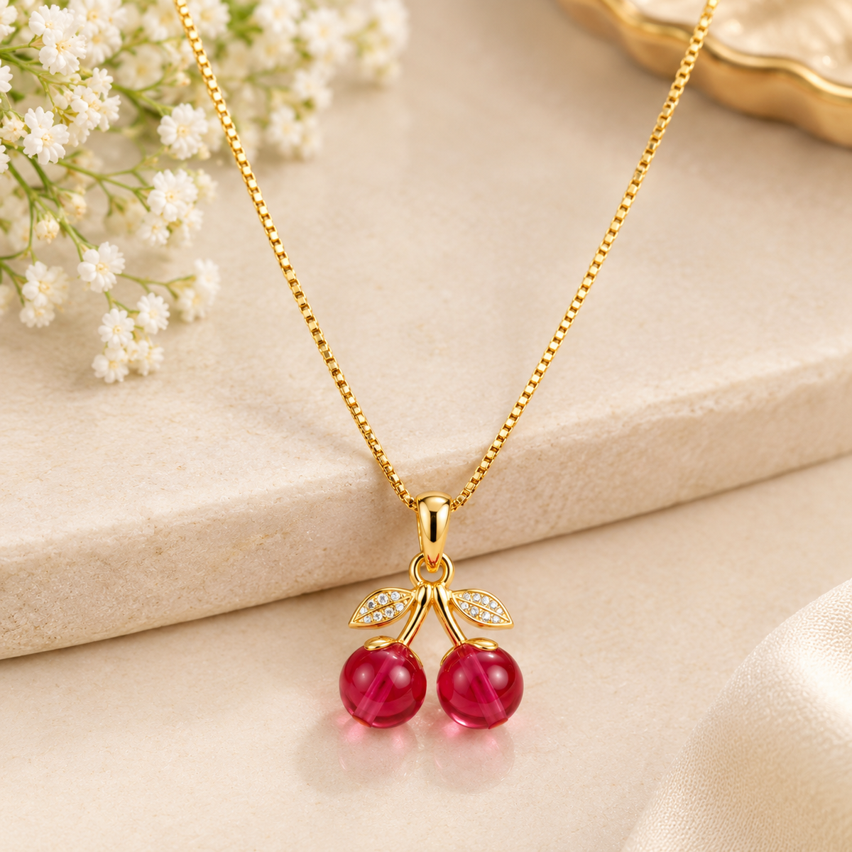 GOLD TONE CHERRY PENDANT NECKLACE